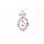 A Belle Epoque natural pearl and diamond pendant, the natural grey pearl with rose diamond set