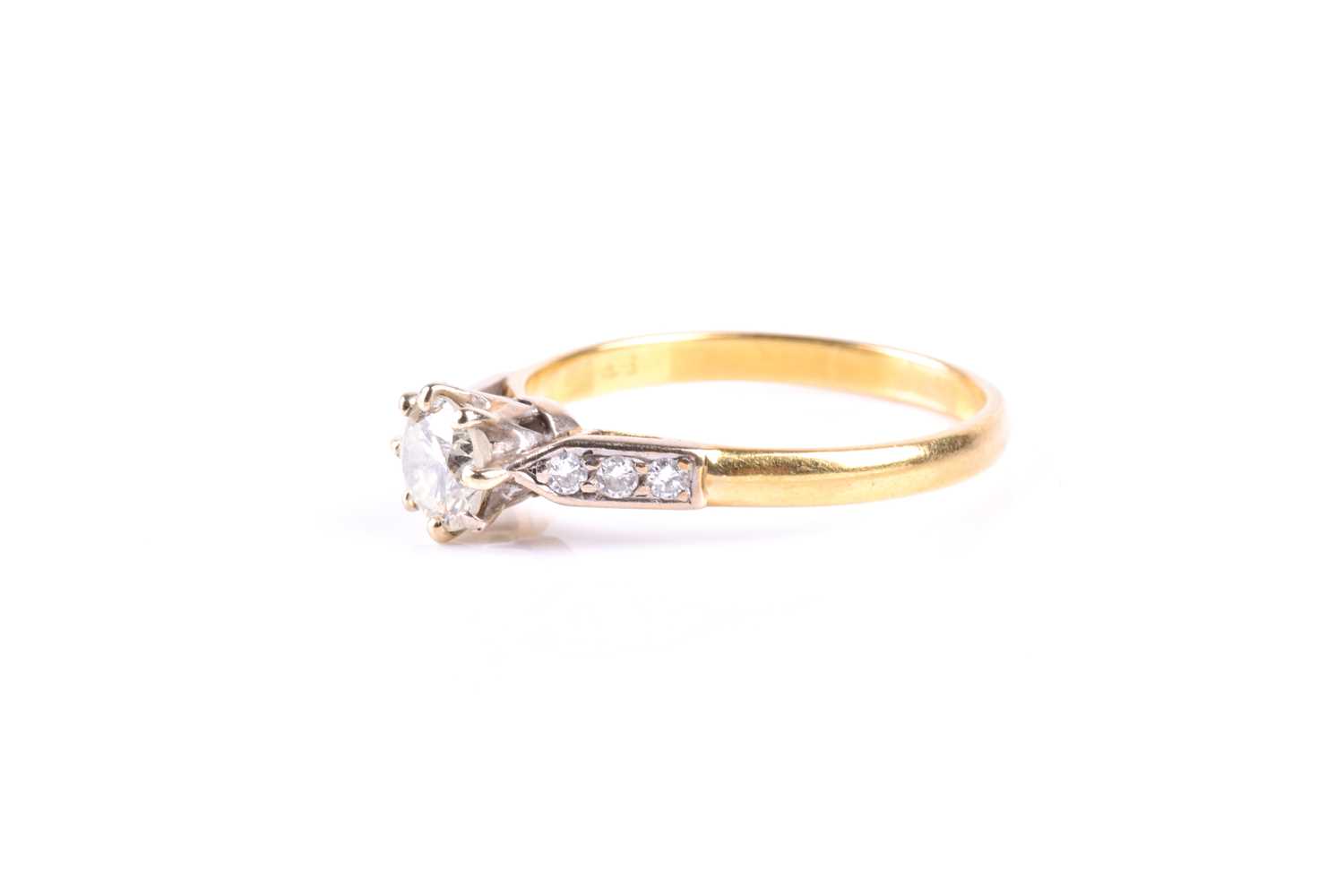 A single stone diamond ring, the round brilliant cut diamond in eight claw mount to three stone - Image 5 of 5