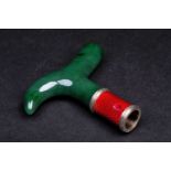 A Faberge nephrite jade walking cane handle, 20th century, with red enamel collar with silver bands,