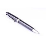 A Montblanc Meisterstuck Pix ballpoint pen, with black resin body and cap, and silver plated metal