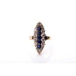 A late Victorian diamond and sapphire ring, the elongated marquise-shaped mount centred with a row