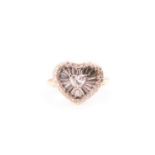 An 18ct white gold and diamond heart-shaped ring, the mount set with a heart-cut diamond of