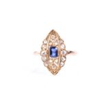 A sapphire and diamond cluster ring, the marquise shaped plaque, with central cushion cut sapphire