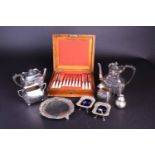 An Edwardian four-piece silver plate tea set, together with other items of silver plate and a