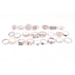 A group of twenty four various silver and white metal rings, some a/f, including some lacking