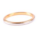 A 22ct yellow gold wedding band ring, with white metal overlay, size M 1/2.Condition report: 2.6