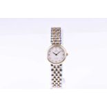 An Omega De Ville ladies two tone quartz wristwatch, the silvered circular dial with Roman