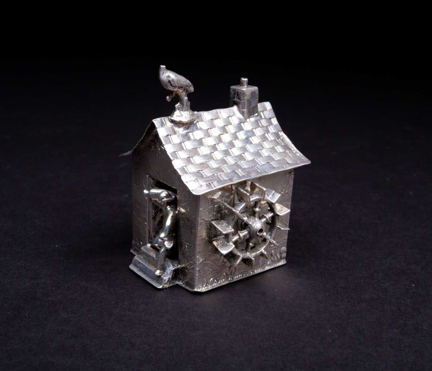 A novelty Dutch silver watermill, import marks for George Bedingham, London 1909, modelled with a