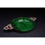 A Russian nephrite jade shallow bowl, 20th century, the rococo style handles in silver gilt and