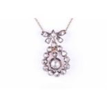 A rose diamond pendant, the pear-shaped drop suspending an old rose cut diamond, from a rose diamond