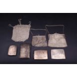 A collection of four silver cigarette cases, the largest 13 cm wide, together with two silver mesh