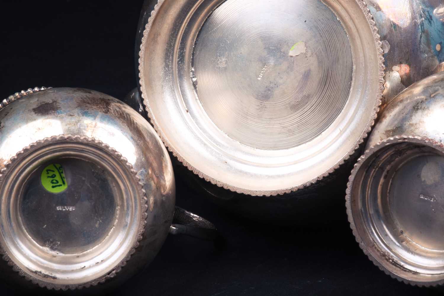 A Continental white metal three-piece teaset, marked 'Silver', comprising teapot, sucrier and - Image 3 of 3