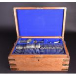 An oak cased canteen, containing a harlequin suite of silver flatware, largely 19th century,
