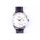 A Seiko Kinetic automatic stainless steel wristwatch, the white dial with gilt numerals, date