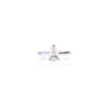 An 18ct white gold and diamond ring, the single pear-cut stone of approximately 1.20 carats,