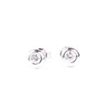 A pair of 18ct white gold and diamond earrings, set with round brilliant-cut diamonds of