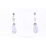 A pair of chalcedony pendant earrings, the carved and pierced foliate drops suspended from