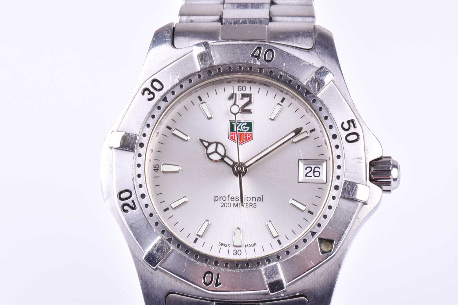 A Tag Heuer Professional stainless steel wristwatch the silvered dial with luminous baton indices,