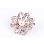A diamond and natural pearl bow brooch, the central pearl within an openwork bow set with mixed