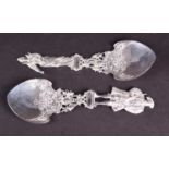 A pair of German Hanau silver figural spoons, 1899 by Berthold Muller, the finials depicting Henry