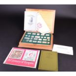 A Hallmark Replicas Ltd set of silver ingots, each depicting the stamps of Royalty to commemorate