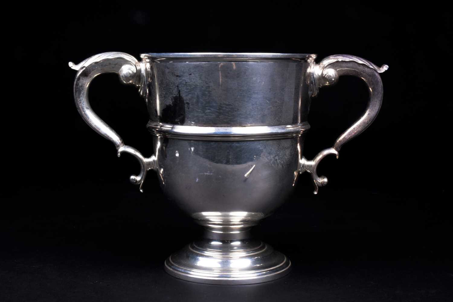 A George V silver twin-handled trophy, London 1920 by Charles & Richard Comyns, 20 cm high, 40 ozt.