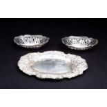 A pair of silver bon bon dishes of oval design, with pierced decoration, hallmarked Birmingham 1912,