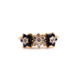 An 18ct yellow gold, diamond and sapphire triple floral cluster ring, the diamonds of