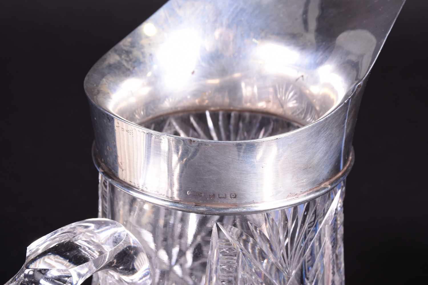 A silver mounted cut glass water pitcher, Birmingham 1938, together with a cased set of silver- - Image 3 of 4