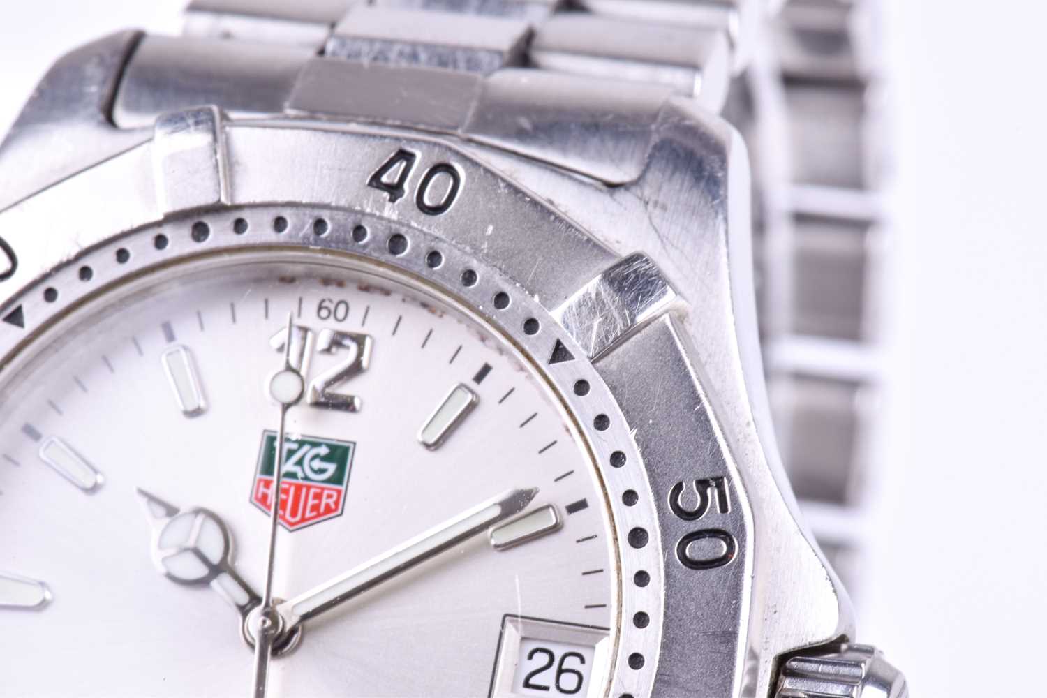 A Tag Heuer Professional stainless steel wristwatch the silvered dial with luminous baton indices, - Image 7 of 10