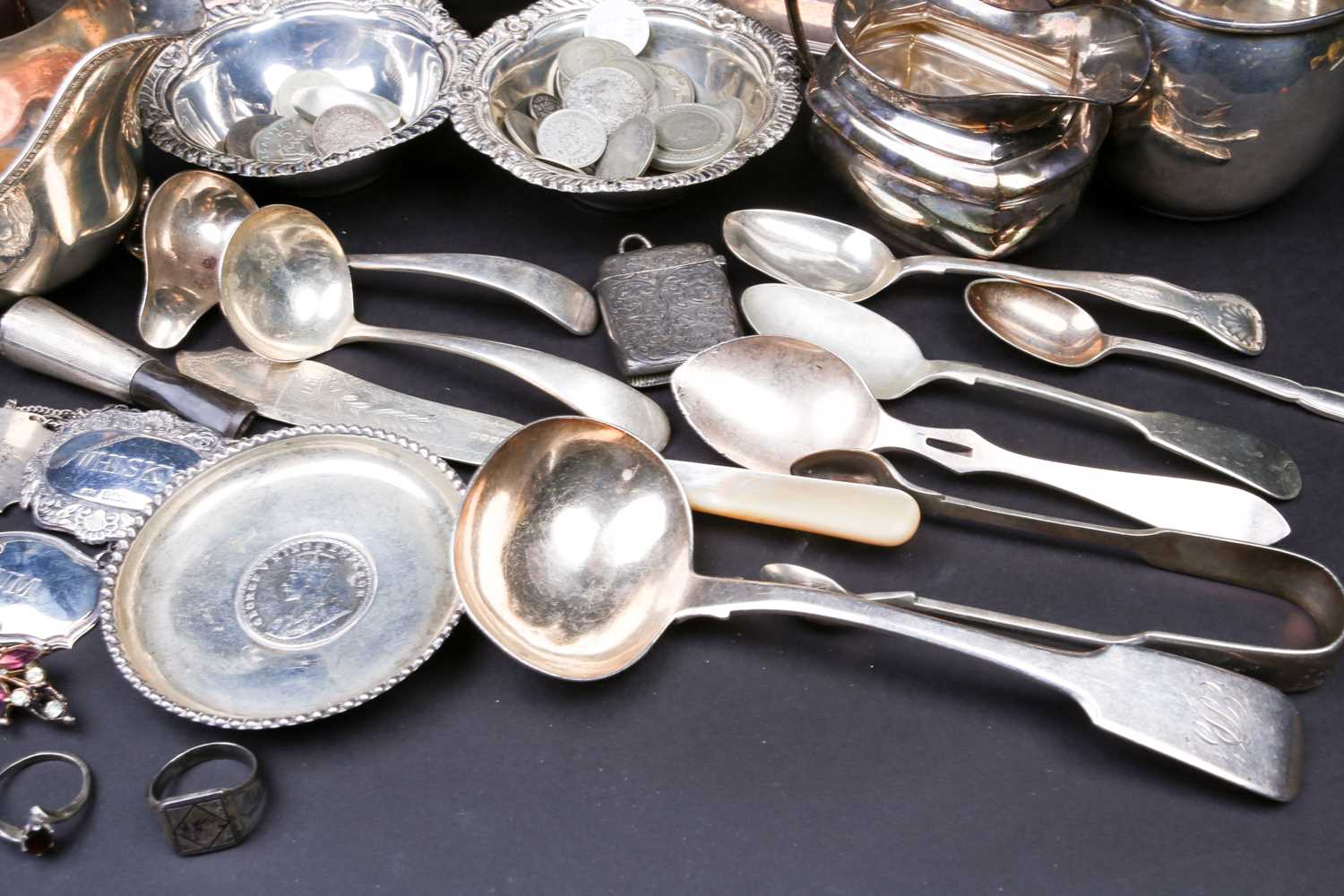 A mixed group of silver and white metal items, to inlcude flatware, cream jugs, a sauce boat, - Image 2 of 9