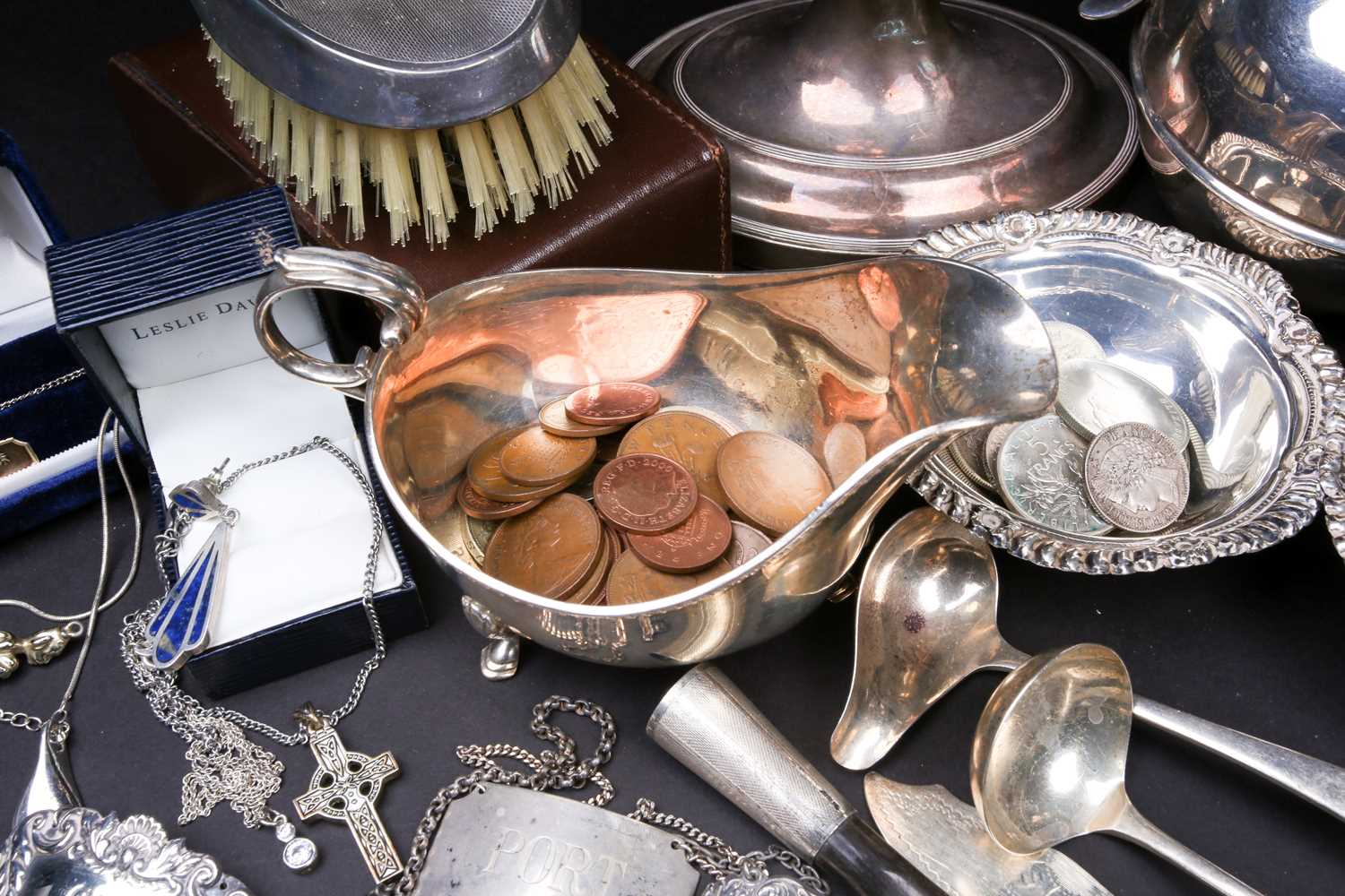 A mixed group of silver and white metal items, to inlcude flatware, cream jugs, a sauce boat, - Image 7 of 9