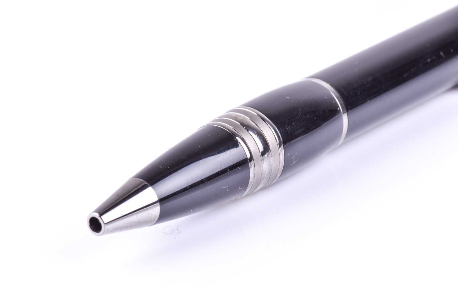 A Montblanc ballpoint pen, with black resin body and black polished metal mounts, with clear rein - Image 4 of 7