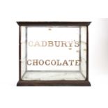 A Victorian Cadbury's Chocolate table top shop display cabinet, the interior to take two shelves and