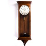 A 19th century walnut-cased regulator wall clock, of large proportions, the silvered dial with