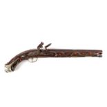 A 19th century Ottoman ornately decorated flintlock holster pistol, with white metal scrolling inlay