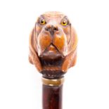 A Black Forest carved wood dog's head walking cane, late 19th century, well defined with inset