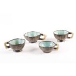 Four Chinese inscribed pewter, Yixing and jade tea cups, Qing, late 19th century, of varying