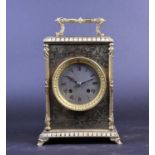 A late 19th century French gilt brass mantle clock, the case decorated in the chinoiserie taste with