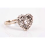 An 18ct white gold and diamond heart-shaped ring, the mount set with a heart-cut diamond of