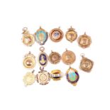 A group of thirteen various 9ct yellow and rose gold pendants, awarded for various sporting