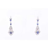 A pair of Art Deco sapphire and diamond pendant earrrings, each flared diamond set drop with a