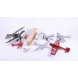 Five W.O. Doylend miniature hardwood model airplanes, built to a scale of 1inch to six feet, each