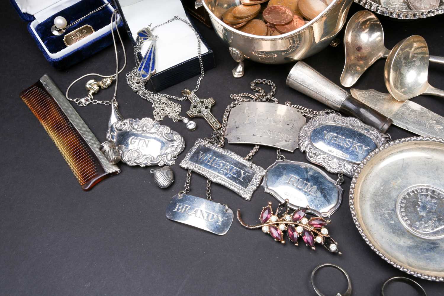 A mixed group of silver and white metal items, to inlcude flatware, cream jugs, a sauce boat, - Image 5 of 9