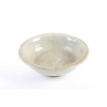 A Chinese celadon brush washer, Song Dynasty, with everted rim and green/grey glaze stopping