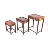 A nest of three Chinese hardwood tables, early 20th century, each of rectangular form with