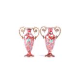 A pair of Russian enamel silver gilt vases, the rims set with diamonds between gilt scroll