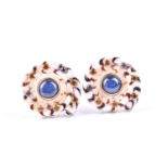Trianon. A pair of sapphire and topaz shell earrings, set with topazand cabochon sapphire accents in