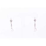 A pair of natural pearl and diamond drop earrings, the drop-shaped pearls with singe stone diamond