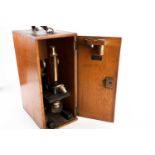 A monocular microscope, by Hearson, London, no.104, cased,32 cm high.